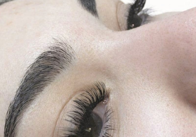 Perfectly defined brow and lash close-up at Serene Suite